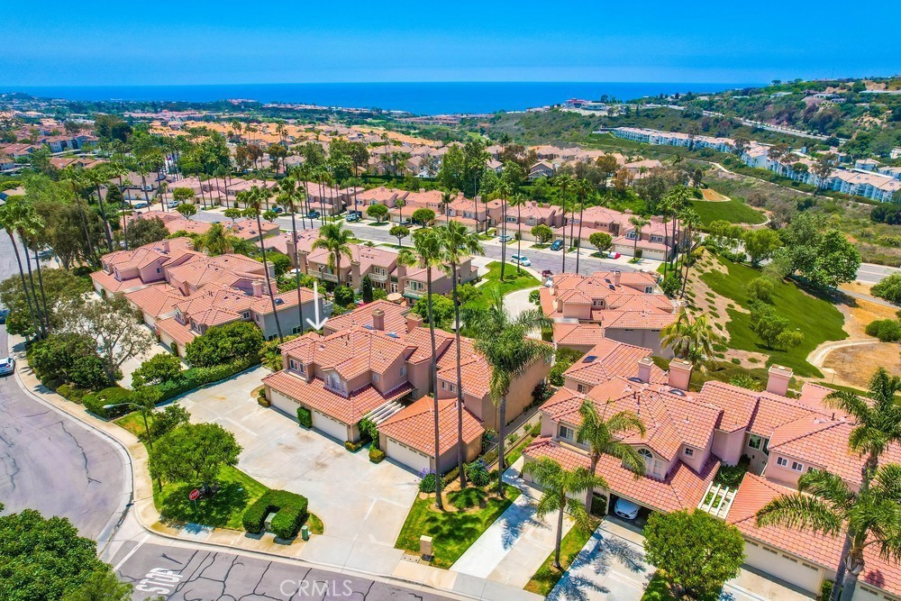 Welcome to the coastal community of Le St. Tropez in Laguna Niguel! This incredible, highly upgraded former model home is a stunning 3-bedroom, 2.5-bath townhouse-style residence that seamlessly combines comfort and style, all while offering breathtaking ocean and canyon views. Ideally located, this property provides an extraordinary opportunity for those seeking an active and vibrant coastal lifestyle. As the former model home, this property occupies the most desirable end unit location.
As you step inside, you'll be welcomed by a spacious open floor plan, perfect for relaxation and entertaining. The living area features large windows that fill the space with natural light, creating a warm and inviting atmosphere. Imagine savoring your morning coffee on the private wrap-around patio while taking in the panoramic vistas.
The well-appointed kitchen is a chef’s dream, equipped with top-of-the-line new appliances, ample counter space, and stylish cabinetry. Whether you're crafting a gourmet meal or whipping up a quick snack, this kitchen will inspire your culinary adventures.
Each of the three generous bedrooms provides comfort and privacy, making this home ideal for families or anyone who appreciates extra space. The master suite serves as a true retreat, complete with a private balcony showcasing stunning ocean and canyon views, an en-suite bath, and a walk-in closet. Each bedroom is thoughtfully designed to ensure a tranquil and restful atmosphere.
This property also includes the convenience of a 2-car garage with EV charger and offers ample storage for all your belongings. Community amenities feature a sparkling swimming pool, tennis courts, well-maintained landscaping, and easy access to nearby walking trails along the coastline.
Located just a short distance from Salt Creek Beach, The Ritz-Carlton, Waldorf-Astoria, and the local shops, restaurants, and entertainment options of Laguna Beach, this property allows you to fully embrace the best of coastal living. Schedule a showing today and immerse yourself in the beauty and serenity that this exceptional home has to offer!