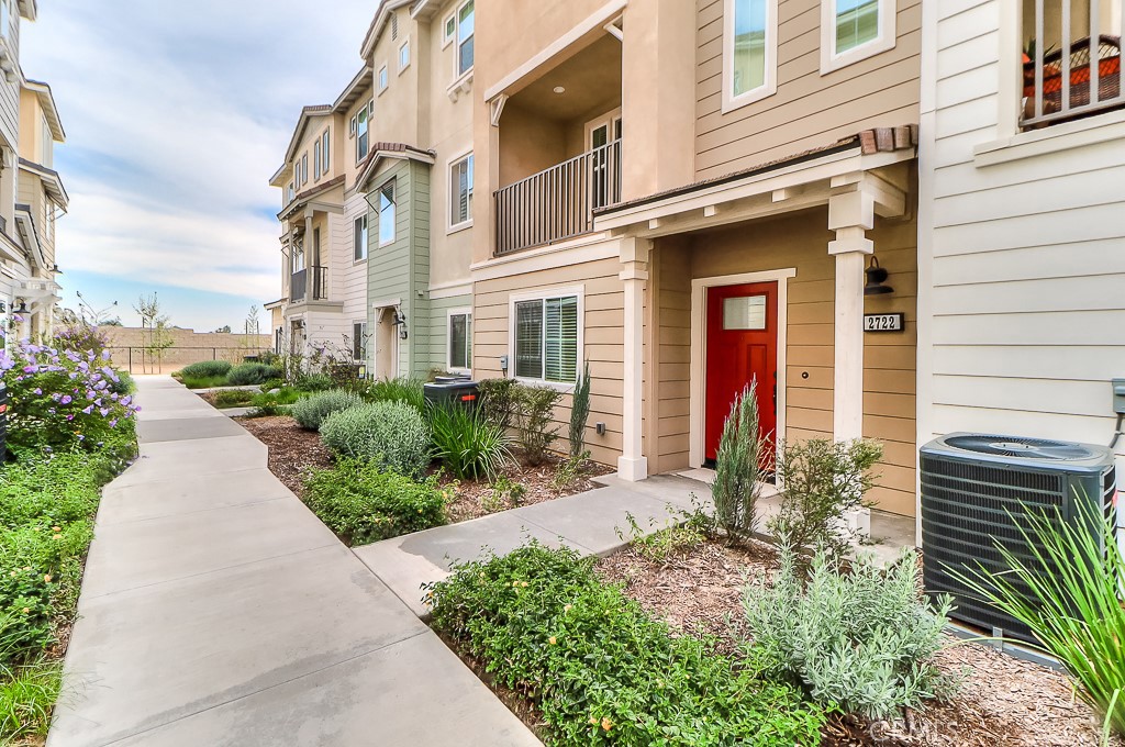 This is a beautiful townhome at Bonita Village in North Pomona with 142 townhomes. This Residence 3 floor plan offers a bedroom suite on the first floor with a private bath and a walk-in closet. On the second level there is a large living space designed with open floor plan that consists of a spacious kitchen with granite counter tops and subway tile backsplash, 2 pendent lights, stand alone dual oven/range combo, refrigerator, white cabinetry, pantry, a large center island for breakfast, a separate laundry room, powder room, living/dining combo, and a private balcony. On the third floor, there are master suite with walk-in closet, master bath with dual sinks and a shower, a tech center, and a 3rd bedroom suite with its own walk-in closet & private bath. The community offers great amenities that included pool/spa, outdoor shower and bathrooms, and BBQ in addition to a dog park. This home is built to ENERGY STAR® standards. Bonita Village is desirable for those favor family oriented small town friendliness and plenty of charm. The location is within a short stroll to the Claremont Village commercial establishments and Claremont Colleges, only a few blocks to Casa Colina Pain Center, Pomona Valley Hospital, the charming La Verne Old Town, La Verne University, Metrolink stations, and easy access to 210 and 10 freeways.