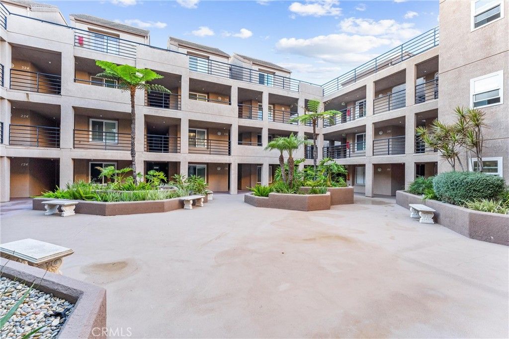 Photo of 1200 Pacific Coast #102, Huntington Beach, CA 92648 (MLS # OC25226364)