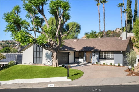 Photo of 7009 Scarborough Peak DR, West Hills, CA 91307 (MLS # SR26218894)