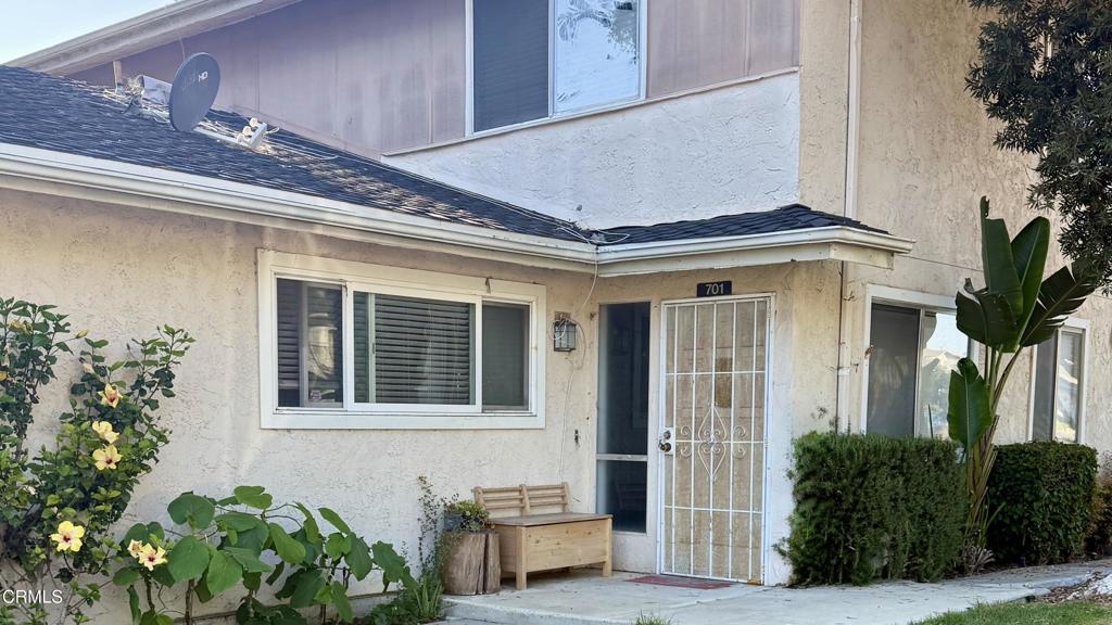 Whether you're looking for an investor-friendly opportunity or your next home near the coast, this Marina Village condo delivers. Just minutes from the Port Hueneme Naval Base and local beaches, this two-story end-unit condo features 2 bedrooms, 1 bathroom, and approximately 892 square feet of functional living space. The updated kitchen includes quartz countertops and wood cabinetry, while tile flooring runs throughout the downstairs. Upstairs, find two bedrooms--one with a walk-in closet--and a full bath. A newer roof and fresh exterior paint have been completed by the HOA. This unit includes a shared two-car garage and access to a community pool. Tenants are in place and hope to remain, offering built-in income for the next owner. With consistent rental demand in this area and a location close to the harbor, shopping, and restaurants, this is a smart option for buyers seeking long-term value and immediate returns.