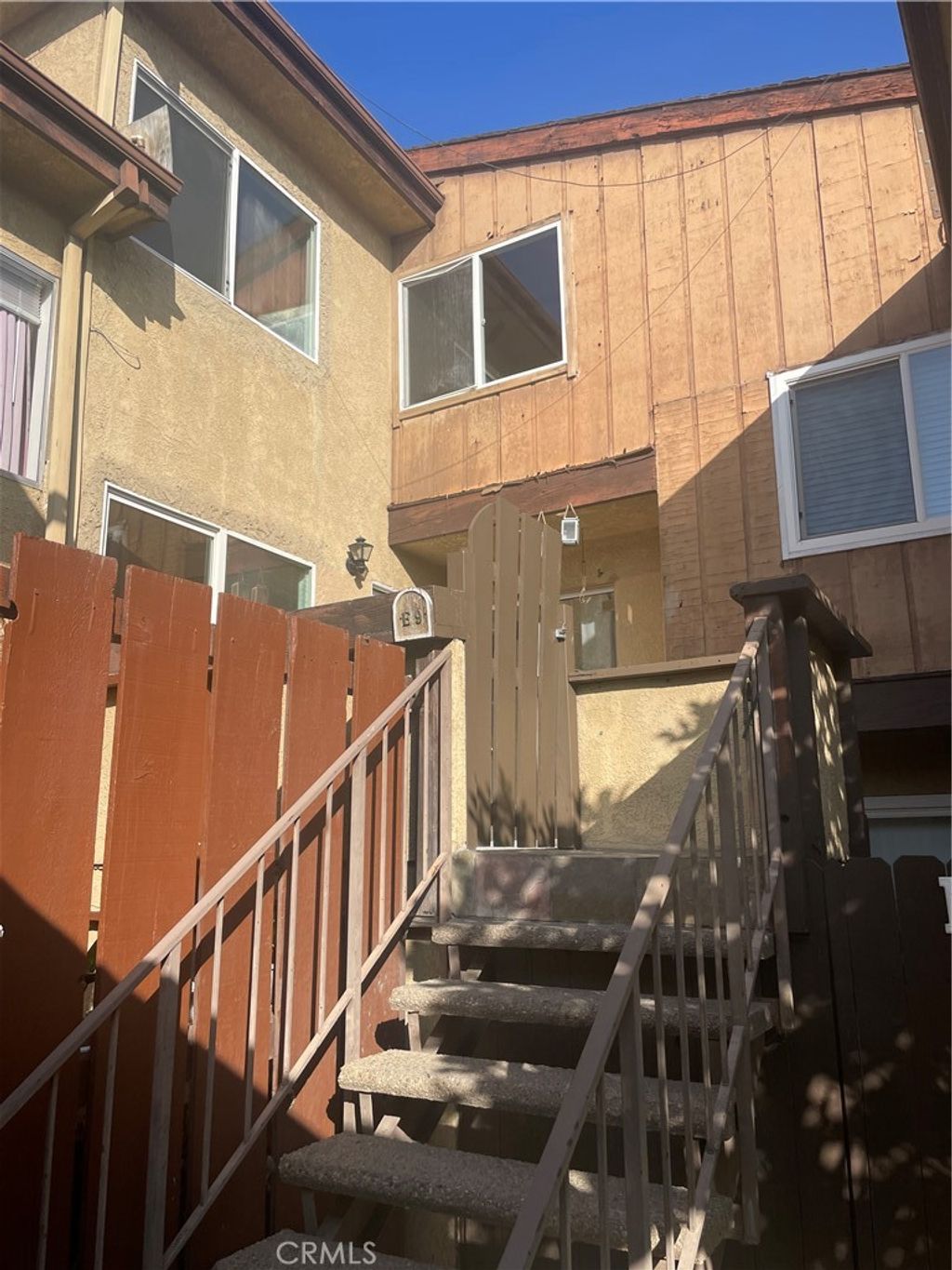 Photo of 7301 Lennox Avenue #E09, Van Nuys, CA 91405 (MLS # SR25253267)
