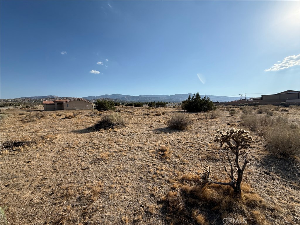 Nestled in the tranquil, rural expanse of Phelan, this versatile 1.01-acre parcel of unimproved land offers a rare opportunity for both residential and commercial possibilities. Ideally located just off Phelan Road, it provides easy access to the freeway and convenient trips into town, as well as nearby shopping centers and restaurants. Zoned PH/SD-COM and serviced by public water, the property offers flexibility for various uses—whether you envision establishing a business or building a brand-new, beautiful dream home with sweeping mountain views. This is a prime canvas for your vision, combining peaceful surroundings with excellent accessibility.