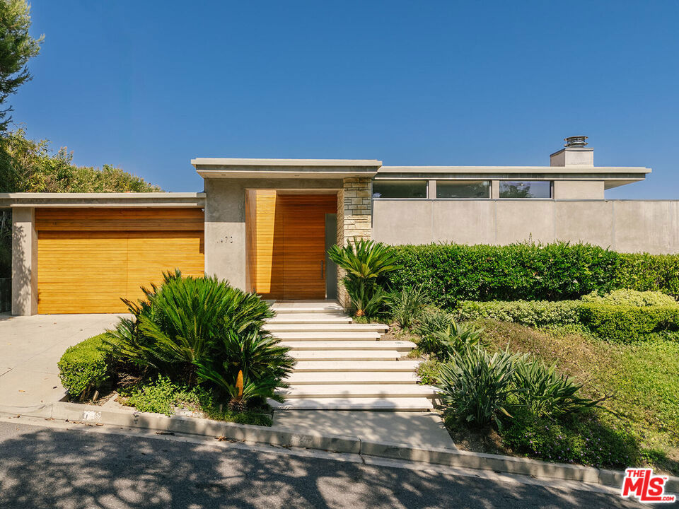 One of Trousdale's finest mid-century view homes. Sophisticated indoor/outdoor living with views from West Hollywood to the ocean. Every luxury a tenant might wish comes included in this 3 bed, 4 bath well-maintained estate - two fireplaces, custom kitchen and resort-like pool. Luxuriously furnished with top-of-the line materials and design. The primary bedroom stuns with paneled walls, soaring ceilings and walls of glass. Lease includes an off-site estate manager ensuring tenants can focus on their view, pool and guests. All utilities and twice-weekly housekeeping included. Available after Sept 15.