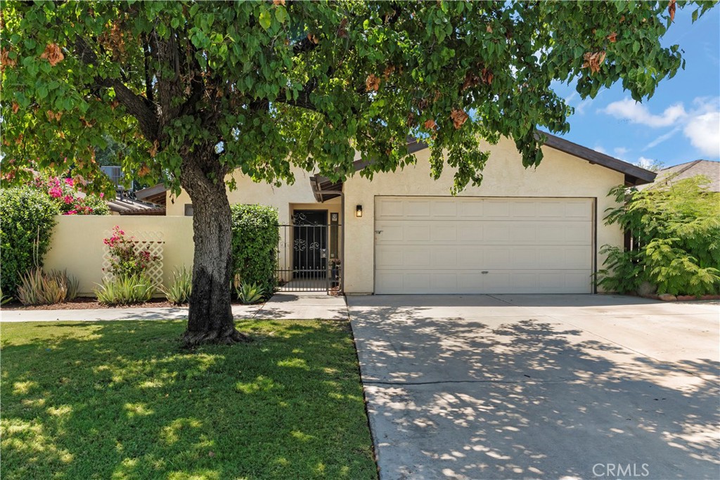 Located in one of Bakersfield's most desirable neighborhoods, this beautifully updated 3-bedroom, 2-bath home offers comfort, style, and move-in ready convenience. Step into a spacious living room with updated flooring, a cozy fireplace, and an open layout ideal for gatherings. The kitchen provides ample cabinet space and opens to a covered patio, perfect for relaxing or entertaining outdoors. The primary suite features its own en-suite bath, while two additional bedrooms are light-filled and welcoming. With an attached garage with brand new epoxy floor covering, and easy access to shopping and dining, this home is a perfect fit for families or anyone looking for a beautiful place to call home. Don't miss your chance-schedule a showing today!