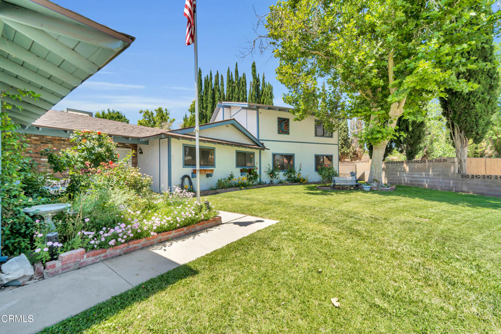 TWO HOMES IN ONE! This unbelievable property is a cant-miss opportunity! One of the most unique featured areas inside is a spacious permitted addition with its own living room, cozy fireplace, wet bar, and a private upstairs master suite with a walk-in closet and full bathroom. With the potential for 6 bedrooms and 4 full bathrooms, including two full baths in the addition (one on each floor with showers), this layout is perfect for multi-generational living or rental opportunities! The main home boasts an upgraded kitchen with refinished cabinets and new hardware, granite countertops, 9 feet of added cabinetry and counter space and brand-new stainless steel double ovens and stovetop with stylish upgraded tile flooring throughout. Enjoy peak outdoor living with a large backyard featuring a pool with new pool pump, two patio covers with new roofing and paint, a charming built-in gazebo and a spacious utility shed. There's also massive RV parking space, a new roof, an upgraded sewer line to the street and an added electrical panel in the backyard with plenty of power for an ADU addition. This home offers comfort, versatility, and room to grow -- don't miss this rare opportunity!