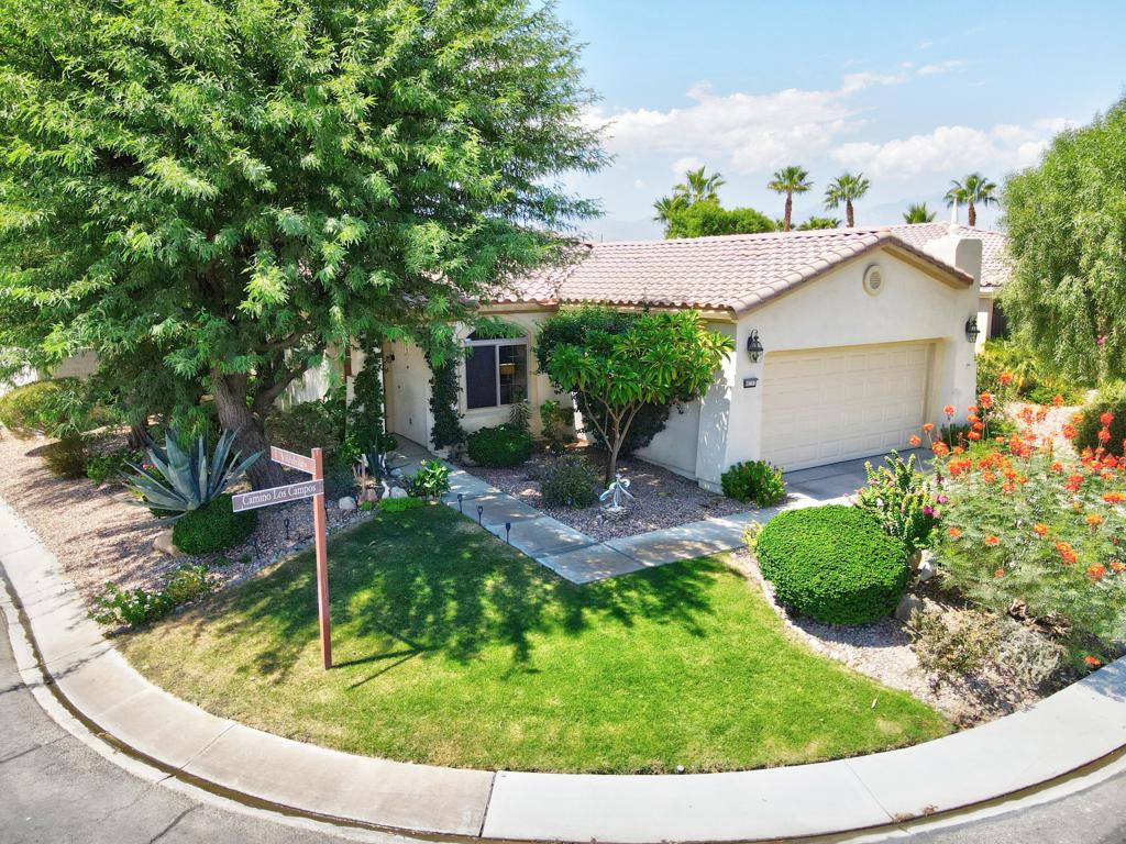 Peaceful San Ysidro Retreat in Sun City Shadow Hills with 8,276 sqft Corner Lot Privacy. Step into the highly desired San Ysidro model, perfectly located in the heart of Sun City Indio --a community known for its vibrant lifestyle and unmatched amenities. This home offers the best of both worlds: a private, tranquil retreat indoors paired with an active, social environment just outside your door.Inside, you'll find a bright, airy layout filled with natural light and high ceilings. Large windows frame views of mature landscaping, while the open great room and French doors to the den provide flexible living spaces. The home has been lovingly cared for with thoughtful upgrades, including tinted bedroom windows, refreshed baseboards, and upgraded smoke alarms. The backyard is private and serene--perfect for unwinding, gardening, or enjoying time with pets. Sun City Shadow Hills offers two championship golf courses, clubhouses, fitness centers, swimming pools, tennis and pickleball courts, restaurant, social clubs, and endless opportunities for connection and recreation. Whether you prefer morning walks among tree-lined paths, afternoons on the golf course, or evenings with neighbors at community events, the lifestyle here is second to none.This is the one you have been waiting to make an offer on.