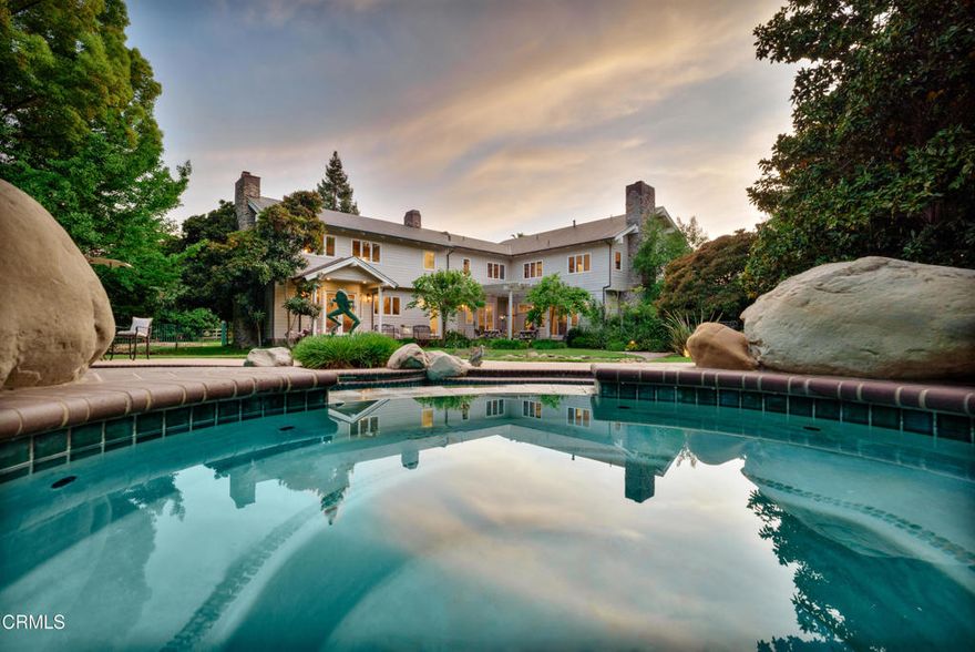 Spectacular Addition & Remodel 2024 ROYAL OAKS--Ojai--A Rare Opportunity to acquire this prestigious 5.33-acre, 6,000-sq-ft with 1,800-sq-ft, six-car garage, gated estate. This is Location, Location. Location surrounded by lush, mature landscaping, which offers serene privacy, as well as convenience as it is hidden in the heart of downtown Ojai. The addition/remodel presents a luxurious modern farmhouse featuring Italian Appliances, Brazilian Stone, Buck-Skinned Wood, Marble Slab Showers, Marble and Travertine Flooring, Doug Fir Beams & Detail, Cedar Siding (think Hamptons), with consideration for detail and extensive architectural appeal throughout created by top designers with benefit & security of the Smart home features and secured location within a private community. Topped with a stunning all-copper roof!  Two Primary Suites, four fireplaces, Library, Media, Living and Family Rooms, also a Wine Cellar with Tasting Room and even a Massage Room, then there's the 1,800-sq-ft, six-car garages and workspace (easily convert a portion to ADU or ?). Moving outside, the extensive landscaped grounds are supported by the private well. Then, of course a pool/spa, bocce, volleyball court, numerous gazebos and gathering spaces, a family orchard, and even a nine-hole putting green and driving range. The beautiful grounds are integrated in the home's living via the many custom windows through which you're able to enjoy the entire property and views of Topa Topa & Black Mountain.This is a foundation for a truly discerning lifestyle.
