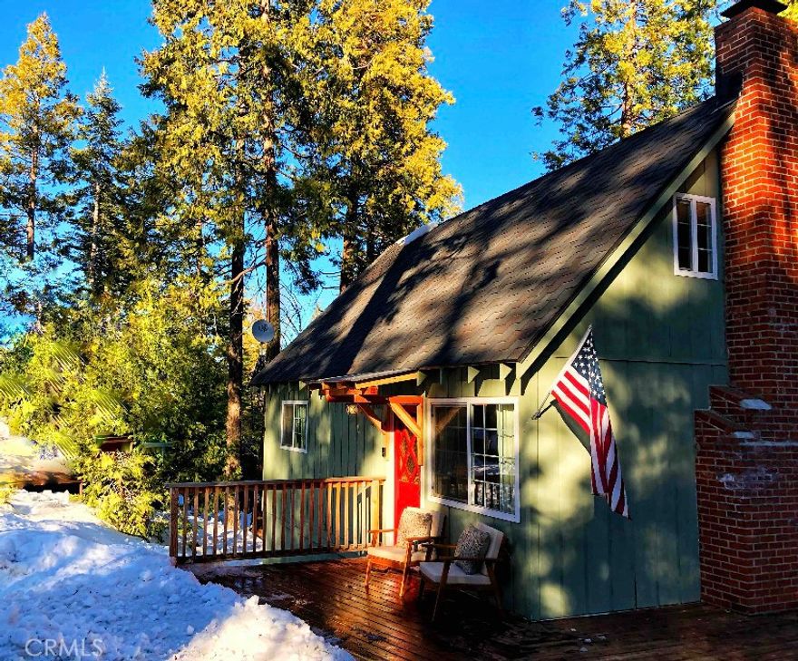 : Discover your perfect mountain retreat with this beautifully updated 3-bedroom, 1.5-bathroom cabin in the desirable East Village of Shaver Lake, CA. Spanning 960 sq. ft. on a spacious 8,145 sq. ft. lot, this fully furnished gem is a proven vacation rental, complete with its successful rental calendar for seamless income potential or personal enjoyment. Step inside to a bright, modern interior featuring a fully renovated kitchen, perfect for preparing meals. The open-concept living area boasts a cozy wood-burning fireplace with a blower, ideal for cozy Sierra evenings. Updated waterproof flooring flows throughout, paired with central heat for year-round comfort. Recent upgrades include a new deck, roof, and windows, ensuring low maintenance and lasting charm. Unwind in the private 2-person spa under the stars or relax on the spacious deck, surrounded by serene Sierra views. Just a 15-minute walk to Shaver Lake and a 6-minute stroll to Shaver Lake Pizza, this East Village cabin offers easy access to boating, fishing, hiking, and skiing at nearby China Peak Ski Resort. This turnkey property is a rare opportunity for investors or vacation home seekers. Schedule a viewing today to claim your Shaver Lake oasis!