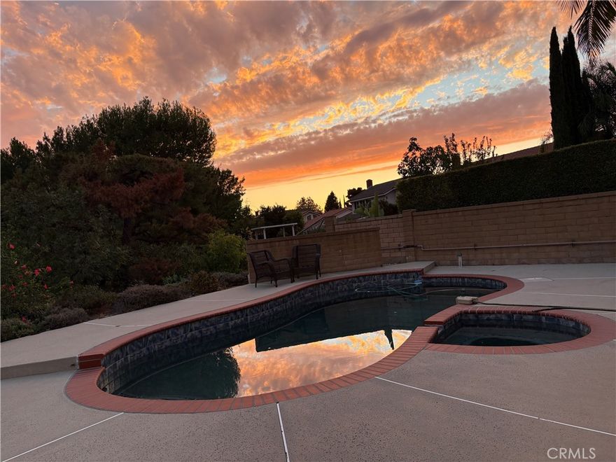 Nice single story pool home with canyon views sits on top of hills*4 bedrooms and 2 full baths*double door entry with vaulted ceilings*entire house with engineering wood floor* step down living room with cozy fireplace*formal dining room*newer remodeled kitchen*step down family room with view of backyard and canyon view*hallway leads to master suite and another three bedrooms*one of bed room used as office*newer remodeled master bath and hallway full bath*2 car attached garage with washer and dryer included*large backyard with pool and hot tub*matured fruit trees*concrete pathway to the down- slope garden*very quiet cul-de-sac street*minutes drive to H-Mart shopping center*easy freeway 57 & 60 access* minutes drive to Brea Mall and Rowland Heights for shopping and dinning*Excellent Walnut Valley School district*Diamond Bar High School*South Point Middle School * and Castle Rock Elementary School*first month rent plus two month rent as  security deposit to move in*pool and gardening services are paid by the landlord*