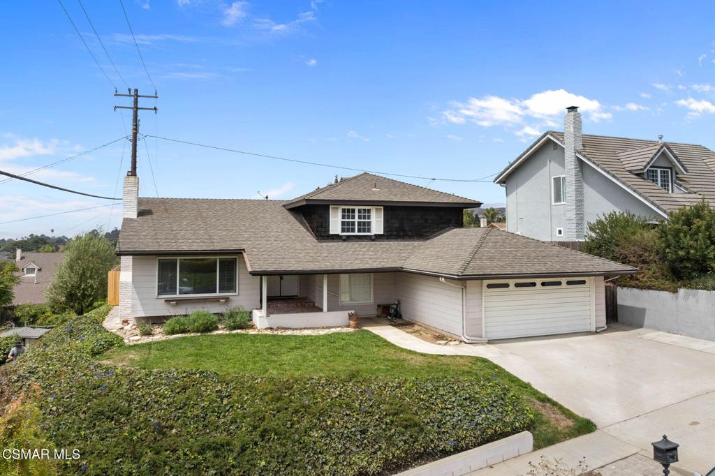 Welcome to 159 Donner Avenue, a beautiful 5 bedroom, 3 bath tri-level home perched in the desirable hills of East Ventura. Enter through a charming front porch and discover open, bright living spaces enhanced by vaulted ceilings, cozy fireplace, and thoughtful layout. The kitchen flows to a casual dining area and sliding doors that open to a generous backyard with views and low-maintenance landscaping perfect for indoor-outdoor living. On the lower level, enjoy a private primary suite with direct deck access. Upstairs, 4 additional bedrooms and a full bath offer space and privacy. Additional highlights include a formal dining room, spacious living room, separate office/play area, large pantry, in-unit laundry, and an attached two-car garage. With dual-pane windows, shutters, and an insulated quiet garage door, comfort and efficiency are built in. This home sits on a flat lot in a quiet hillside neighborhood, just a short stroll to Poinsettia Elementary, Balboa Middle, & Buena High School. Don't miss this Ventura gem where timeless charm meets modern living and endless potential.