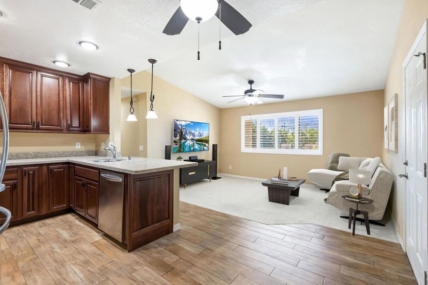 Enjoy Picturesque Mountain Views from this 3 Bedroom - 2 Bath Home. This Custom Home features hickory cabinetry in the kitchen complimented by granite countertops and brand new carpeting throughout, all appliances upgraded and a light and bright livingroom with vaulted ceilings and perfectly framed views of the San Jacinto Mountains- You can even watch the Tram as it departs! The Primary, w/ en suite, has beautiful Western Mountain Views via direct balcony access and features a contemporary slate & glass shower with stylish vanity and fixtures. Second bathroom completely updated with a fully tiled shower.  Second bedroom has additional balcony access as well. Full size washer and dryer with additional storage closet in hallway. Spend your time enjoying the views and desert lifestyle rather than working on renovation projects. Check out the New Look at Cathedral Springs - A gated community conveniently located just 10 minutes from Downtown Palm Springs. Amenities include a fitness center, multiple pools and spas as well as Low HOA's. This home is on FEE Land (Not lease land). Some photos virtually staged.