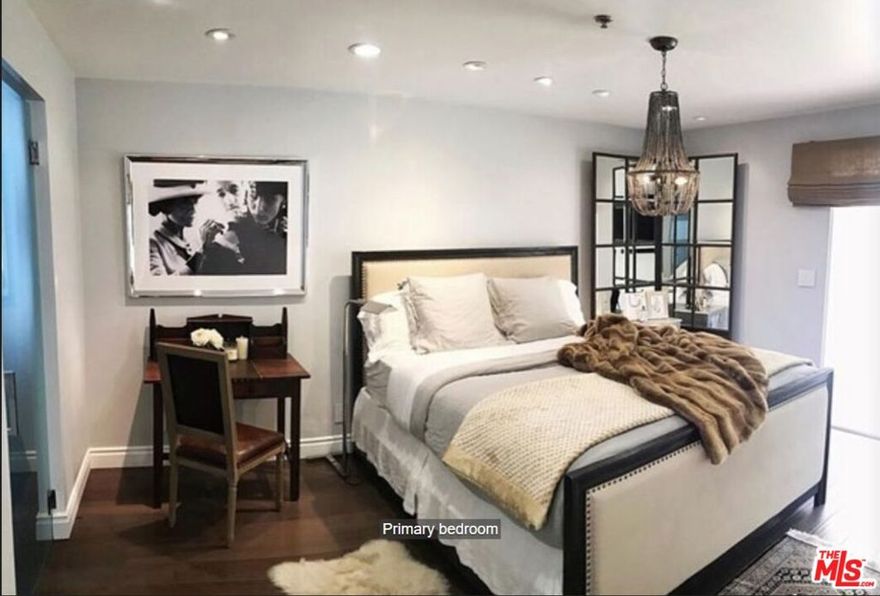 This fully remodeled stunner is in the esteemed Shadow Ridge community and has it all. Stairs take you up the 2nd floor of the unit. Upon entry, you will enjoy an open floor plan to the family room featuring Italian marble fireplace and a formal dining room. There are recessed and ambient lights, and engineered wood floors throughout. The kitchen has been fully remodeled with marble counters, new white cabinets and stainless steel appliances. The primary bedroom has a sliding door that leads you to the patio with views of the mountains and total privacy. It also offers a large walk-in closet with built ins. The 2nd bedroom is a great sized room also with sliding door to the patio. The patio is the perfect place to relax or entertain(it is not enclosed). The assigned 2 covered carport spaces are steps away from the unit, there is no garage. Unit comes ready with washer, dryer and stainless steel refrigerator. The community offers a resort lifestyle with 2 indoor Raquetball courts, 2 swimming pools and spas, BBQ area, gym, volleyball and basketball courts, park, hiking trails and is pet friendly.
