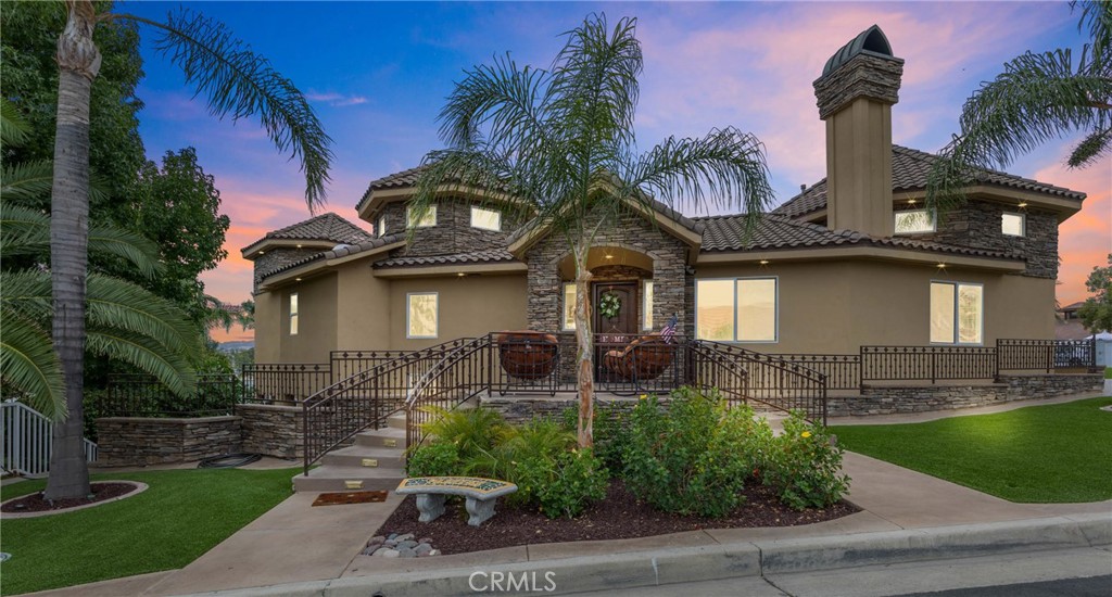 Enjoy Resort living in the gated community of Canyon Lake. This custom-built lake front home, HAS IT ALL!! Offering STUNNING MAIN LAKE VIEWS, a dual-shared dock, a saltwater pool & spa with a spillover water fall & rock water slide. This 4 bedroom, 2.5 bath home features tumbled travertine throughout, a huge bonus room, office with custom file cabinetry, and an apx 1200 sqft garage with a custom-built bar. The main level of this home includes all 3 bedrooms and an open floor plan living, kitchen, coffee & wine bar, and dining area which leads out to the large covered lanai with gorgeous lake views. The chef style kitchen features a pounded copper farm sink, SS Decor appliances, propane cooktop, walk-in pantry, and a dumbwaiter to assist from the lower level. The oversized primary room displays breath-taking main lake views, a large walk-in closet, custom vanity with a private tv, and a large roman tub. Down the beautiful stairway, you will find the office and large bonus room including a wet bar, private entry speak easy doors, and a patio overlooking the rock pool & lake! Follow the lighted steps to your dock and a relaxing covered cabana to take in the beautiful lake scenery. Canyon Lake is a privately gated city, with 24/7 guards, 2 restaurants, tennis, basketball, & pickle ball courts, parks, a golf course, an Olympic sized pool, and much more, making this home an entertainer's dream!