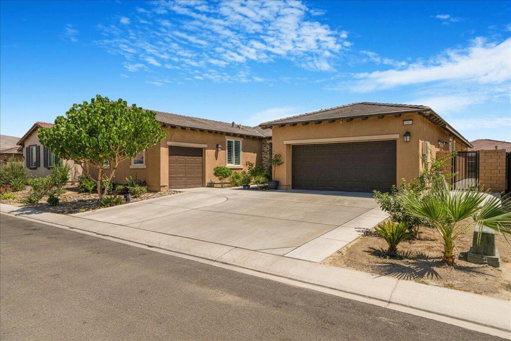 LOWEST PRICE in Paradiso Community! Gorgeous 2021 home w OWNED SOLAR PANELS in a gated community exudes refined comfort and thoughtful design. From the moment you enter, you're greeted by an expansive open floor plan that effortlessly connects the living room, dining area, and kitchen. The living room features a modern fireplace that adds warmth and ambiance, while large windows framed with custom shutters offer both privacy and style. This 4 bedroom, PLUS an office/den/5th bedroom, 3 full bathrooms PLUS a powder room has it all for you!The kitchen is a chef's dream, anchored by gleaming white quartz countertops that stretch across a generous island and wrap around sleek cabinetry. Stainless steel appliances and designer fixtures complete the space, making it as functional as it is beautiful. Throughout the home, custom shutters are a consistent design element--tailored to each window, they add a layer of sophistication and timeless charm. Whether closed for a cozy evening or opened to welcome in the California sunshine, they elevate the aesthetic and enhance energy efficiency. Step outside to a private patio or landscaped backyard, perfect for relaxing or entertaining. This home blends luxury, practicality, and a touch of personal flair in every corner.
