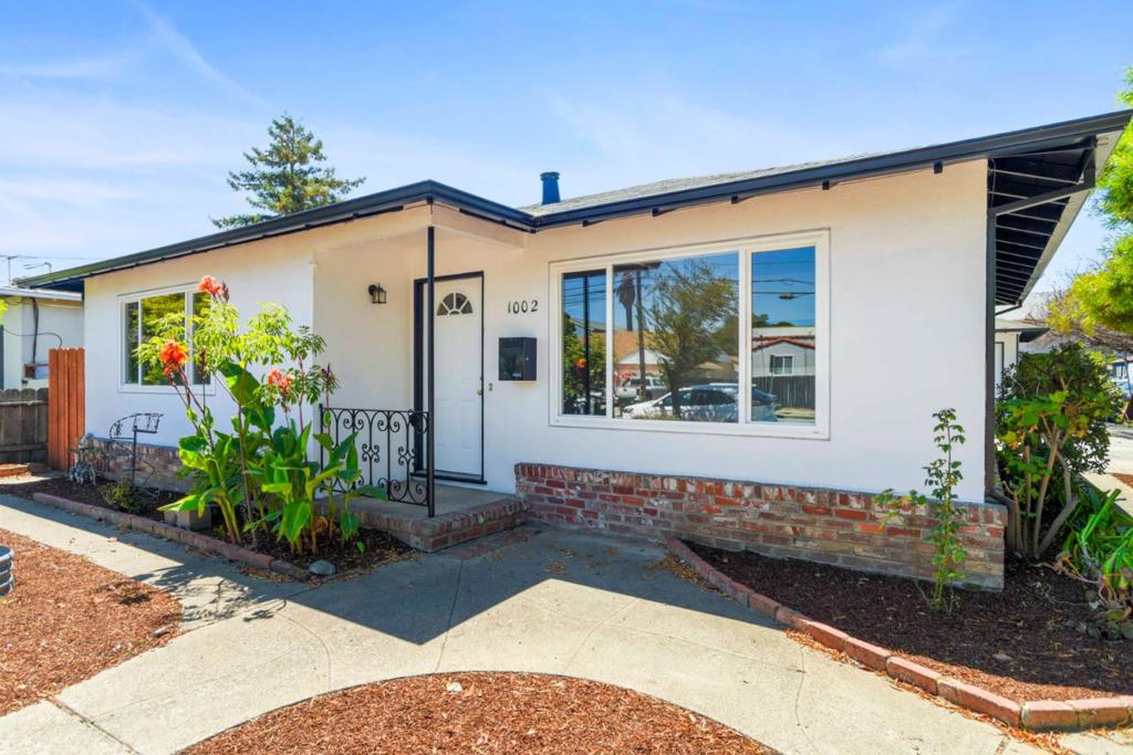 Fantastic Fully Vacant Duplex Opportunity in the heart of San Mateo! Welcome to this move-in ready two-unit building, featuring (2) 2-bedroom, 1-bathroom units, both with private outdoor spaces, separate attached garages with washers/dryers + additional storage space. Both units have been extensively updated including remodeled kitchens and bathrooms with quartz countertops & white shaker cabinets, refinished hardwood floors, new garage doors, new interior & exterior paint, new lighting & more! The expansive lot enjoys a large front yard tucked behind lush trees, multiple planter beds + additional driveway parking outside of each garage. Options abound - use as an investment property with two rentals, live in one and rent the other one out, or use both for a multi-generational family. Centrally located just blocks to Downtown San Mateo shops and restaurants, Central Park, major highways 101 and 92, Caltrain, and across from Sunnybrae Elementary School.