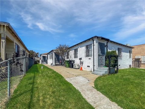 Photo of 10405 S Hoover Street, Los Angeles, CA 90044 (MLS # SB26048719)