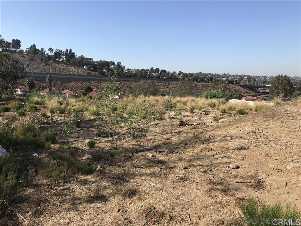 ************** B A C K ON THE M A R K E T ***************** *****Panoramic Views-Over 2 Acres of Land in Spring Valley***** This vacant parcel of over two acres offers excellent potential for development. In the past, an application was initiated with the County for the possibility of multi-unit housing, which triggered a review process requiring further study with the County. Currently, the property is zoned R-1, allowing for the construction of a single-family residence with the potential to add an ADU. Any proposal for more than one residence would require additional review and approval from the County. The property also carries a “P” designation from a previous request to build multiple residences. San Diego Gas & Electric has been contacted regarding the process for bringing electricity to the lot. The parcel is considered suitable for a septic system. The County has indicated that the existing address—8876 Leigh Avenue—suggests prior permitting activity, although no final permits are recorded. Some site and landscaping plans were once submitted but never finalized; original records belong to the previous applicant. Surrounded by existing homes, the lot is in an established residential area with no known construction restrictions beyond zoning requirements. For further details or to discuss development possibilities, please contact the Listing Agent.