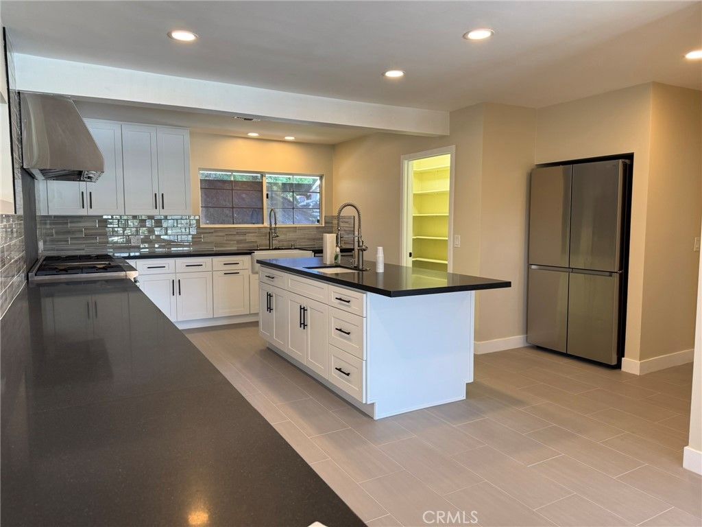 Photo of 5368 Campo Road, Woodland Hills, CA 91364 (MLS # GD25244632)