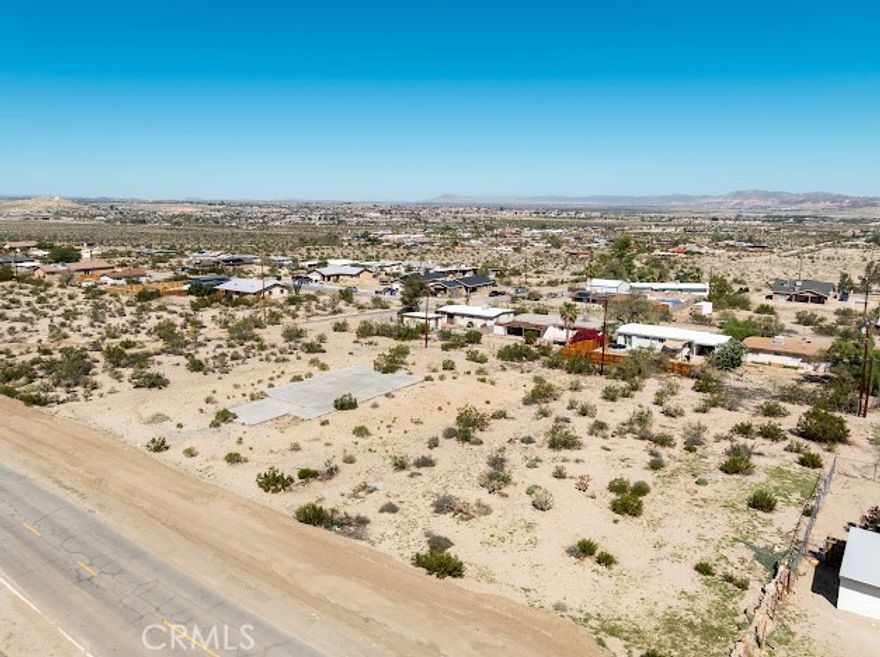 This .99-acre lot on Baseline Rd in Twentynine Palms offers a versatile opportunity for buyers seeking space and potential in a growing desert community. With utilities nearby and open views of the surrounding landscape, the property is well-suited for building a custom home, creating a private retreat, or holding as a long-term investment. Its location provides convenient access to schools, shopping, and Joshua Tree National Park, adding to its appeal. Whether you’re looking to build, develop, or invest for future appreciation, the possibilities are endless. Buyer to verify zoning, subdivision requirements, utilities, and all intended uses with the City of Twentynine Palms and San Bernardino County as part of their due diligence.