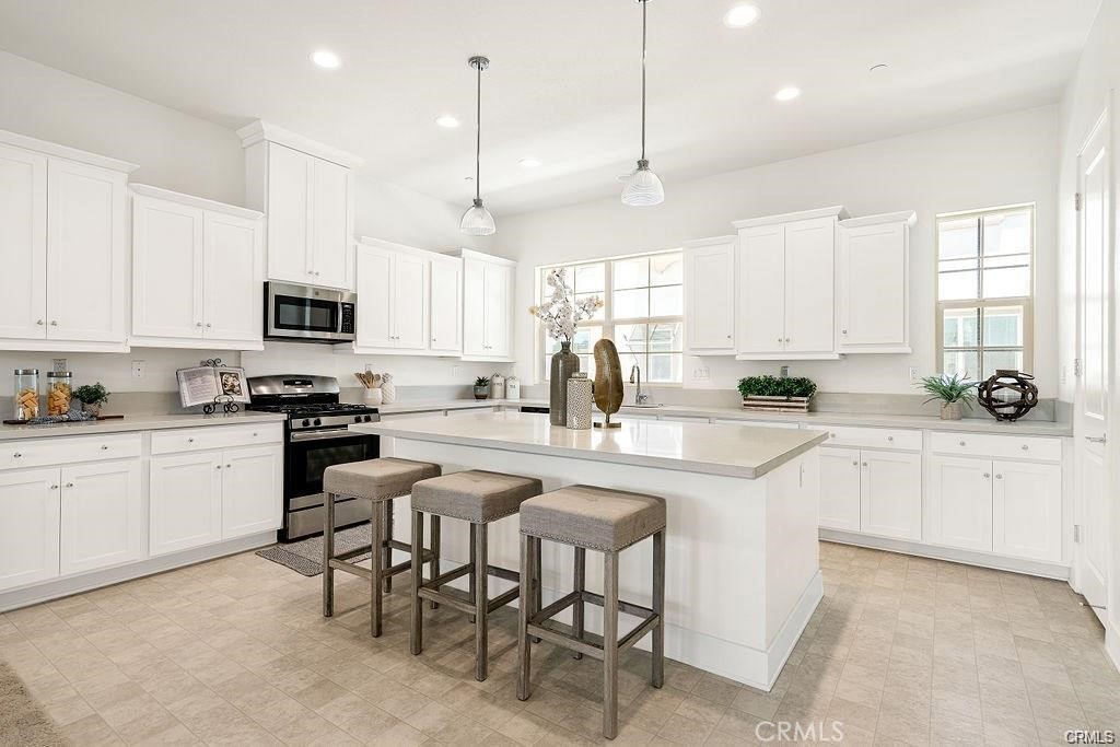 Beautiful townhouse located in the heart of highly desired Chino Hills. This home features an open and spacious floor plan with a main-level bedroom and bathroom, offering extra privacy. Spread across three levels, this newer property is situated in a well-maintained, sought-after community close to shops, dining, and major freeways. Located within a top-rated school district, it’s the perfect blend of comfort, convenience, and location.
