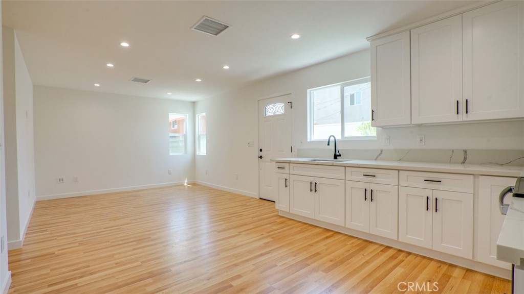 Don’t miss this rare opportunity to own an income generating fourplex in one of Los Angeles’ most rapidly developing neighborhoods near USC! This exceptional property combines brand-new construction (2 units, built in 2025) and upgraded existing units (2 units) for a combined 4-unit investment property.
The property has 3 units available for rent and 1 unit paying rent, making it ideal for investors looking to identify their own tenants and maximize cash flow. With a cap rate of 7.44% and a gross rent multiplier (GRM) of 10.47, this asset presents strong current returns and long-term appreciation in a high-demand rental market.
This property is one of three 4-unit investment properties in the same area available in the portfolio—offering great opportunity for buyers looking to invest in an individual or multiple income-generating assets.
At the rear of the property sits a newly built (2025) duplex, featuring two beautifully designed 3-bedroom, 2-bathroom units—each 912 square feet. These modern residences offer stylish vinyl plank flooring, quartz countertops, dual-pane energy-efficient windows, new water heaters, in-unit washer/dryer hookups, and fully paid-off solar panels for long-term energy savings. These units are not subject to rent control.
The front duplex built in 1914 has been thoughtfully upgraded and includes two spacious 3-bedroom, 2-bathroom units, each over 1,300 square feet. These units also feature dedicated laundry rooms with washer/dryer hookups and updated interiors, providing comfort and convenience for tenants. The property has plenty of onsite parking as well as it is an oversized lot exceeding 7,770 square feet in the heart of Los Angeles.
The property has undergone significant infrastructure upgrades, including a modernized electrical system with separate electric meters and sub panels for each unit, as well as all-copper plumbing throughout.
A 5-minute drive to the University of Southern California (USC), and close proximity to Downtown Los Angeles including Crypto Arena, LA LIVE, this property is perfectly positioned in a high-demand rental market. With easy access to major freeways and everyday amenities, this turn-key property is perfect for seasoned or first-time investors seeking solid returns, low maintenance, and a prime location for continued growth.