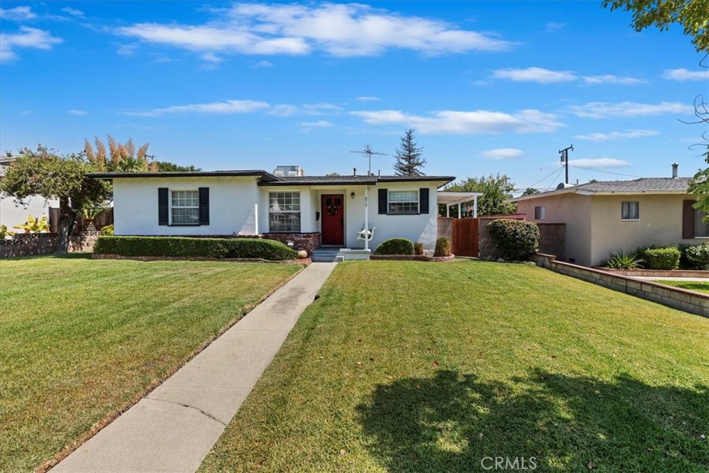 This charming Upland home offers timeless curb appeal and has been meticulously maintained inside and out. Step inside to find beautiful original wood floors that add warmth and character throughout the living spaces. An enclosed patio provides the perfect spot to relax or entertain year-round, seamlessly extending your living area.
The spacious garage provides plenty of room for vehicles and storage, and the property also offers space to park a small RV. Located down the street from the nearby high school, this home combines everyday convenience with a quiet neighborhood feel.
A true pride-of-ownership home, ready to welcome its next owner.