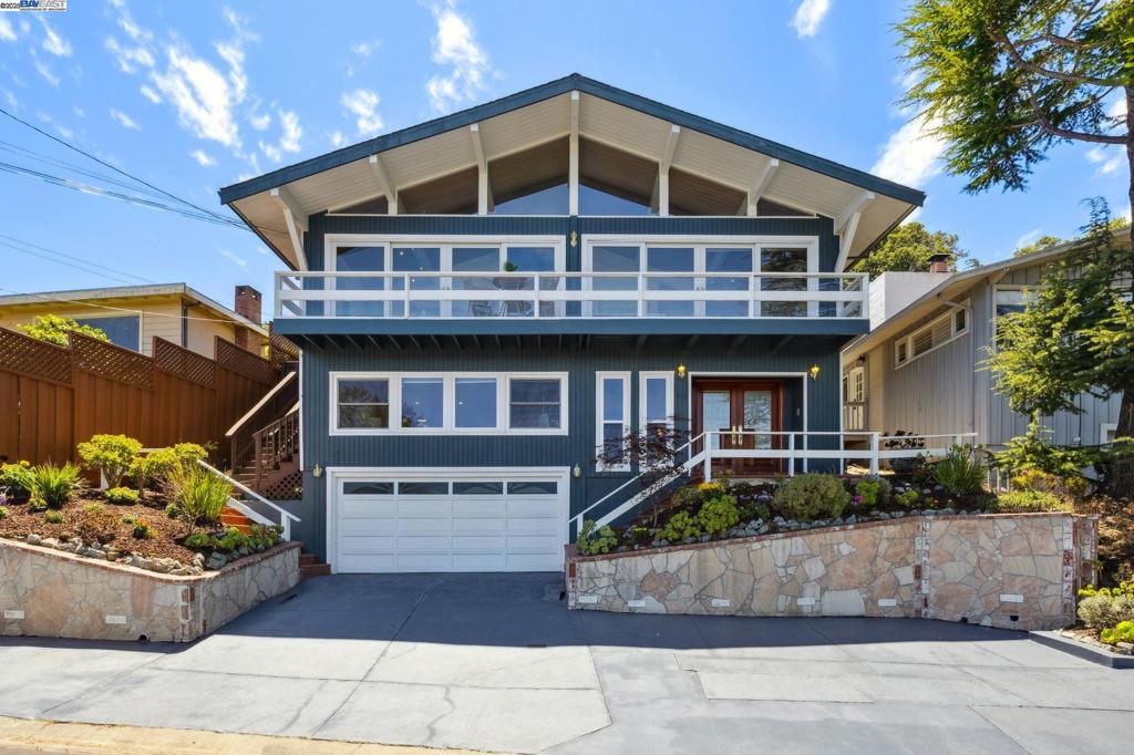 Fabulous 4 bedroom, 4 full bathroom 2 story abode in the Belmont hills with panoramic easterly Bay views. Stately double door and foyer entrance with gas fireplace and 2 of the bedrooms on the lower level including an in-law en-suite with private entrance, hardwood floors, kitchenette, and a private bath that's ideal for an extended family, rental, or Airbnb. The upper level is extraordinary, with a gorgeous great room with cathedral beam ceilings, gas burning fireplace, and a wall of windows with a boutique deck that embrace the captivating Bay views. There's also the primary bedroom with private bath that's attached to a sunroom that can also be accessed from the outdoor space, which is fully fenced and ideal for entertaining with family and friends with a terraced backyard including irrigation and multiple areas to enjoy the stunning Bay views in your own private oasis. Other details include a large 2 car attached garage with automatic door, washer and dryer, and access to the in law. Incredible location with close proximity to everything Belmont has to offer including Ralston middle school, Fox elementary, Waterdog Lake and open space with miles of public trails, major transportation including Caltrain, great local restaurants and shopping, and the Belmont library.