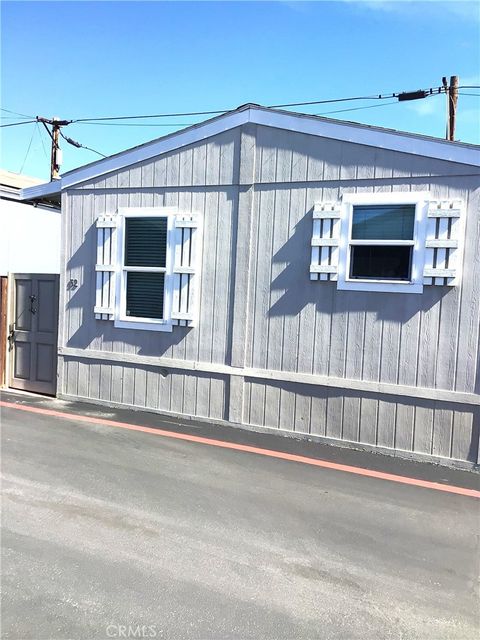 Photo of 7560 Woodman Pl Pl #52, Van Nuys, CA 91405 (MLS # SR26046135)