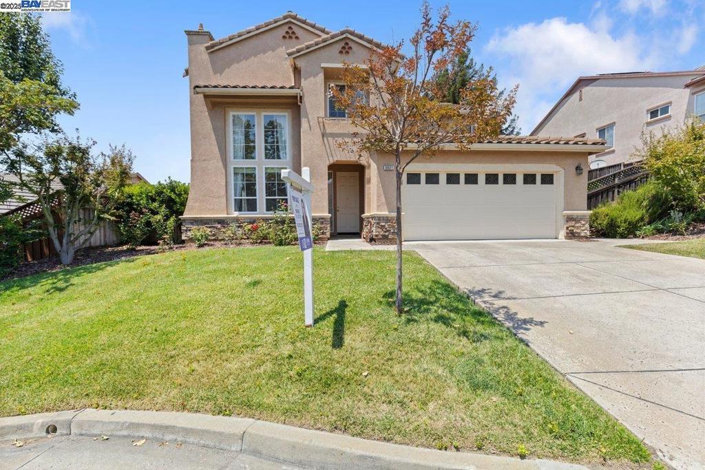 Charming opportunity in the desirable Hiddenbrooke community of Vallejo! This spacious home offers over 2,700 sq ft of living space with 4 bedrooms and 3 full bathrooms, plus a converted office with a closet that can serve as an additional bedroom. Upstairs, you’ll find 3 generously sized bedrooms and 2 full bathrooms, including a spacious primary suite with a walk-in closet and en-suite bath. Downstairs features 2 bedrooms and 1 full bathroom, perfect for guests, extended family, or multigenerational living. Designed for comfort and flexibility, the home boasts vaulted ceilings, a smart and open layout, and abundant natural light throughout. The expansive backyard offers the perfect canvas for gardening, entertaining, or simply relaxing while enjoying peaceful hillside views. Don’t miss the charming variety of fruit trees throughout the yard—including peach, apple, lemon, plum, and kumquat—adding both beauty and bounty! With a little TLC, this home has incredible potential—ideal for buyers looking to build equity or customize their dream space in one of Vallejo’s most sought-after neighborhoods. Residents of Hiddenbrooke enjoy access to scenic trails, golf, and convenient freeway access. Don’t miss this unique opportunity—come see the possibilities for yourself!