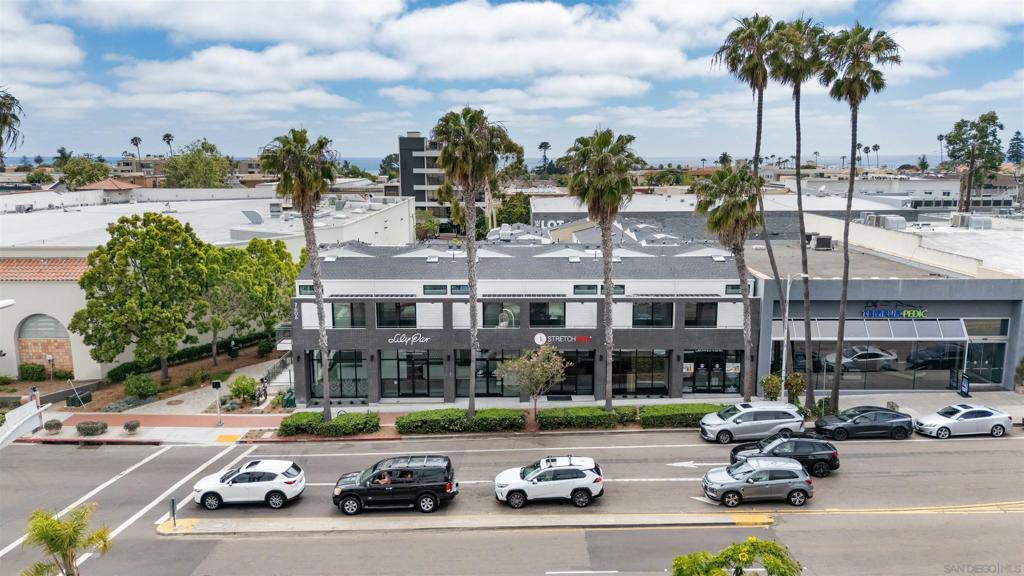 We are pleased to present Girard Lofts, a premier investment opportunity located at 7606 Girard Avenue, La Jolla, CA 92037. This newly constructed, boutique mixed-use community offers a rare chance to acquire a luxury asset in the heart of La Jolla Village, one of Southern California’s most prestigious coastal enclaves. Completed in 2024, Girard Lofts comprises 18 thoughtfully designed residential units, featuring a mix of studio, one-, and two-bedroom floor plans ranging from 356 to 727 square feet. Each residence showcases high-end finishes, including 16-foot ceilings, oversized windows, quartz countertops, stainless steel appliances, luxury plank flooring, in-unit laundry, and private outdoor spaces. The property also offers secured covered parking, bike storage, an outdoor BBQ area, and a boutique lounge for residents. In addition to the 18 residential units, the opportunity includes three bespoke ground-floor retail suites located directly on the highly trafficked Girard Avenue, currently 100% leased to two experiential retail shops.
