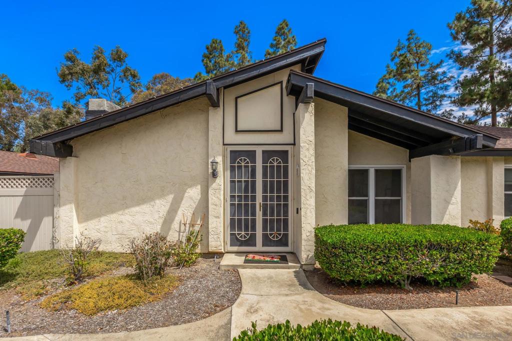 Welcome to 2327 Rosal Ln, a beautifully updated single-level home offering 1,183 square feet of comfortable living space on a 3,049 square foot lot. This charming 3-bedroom, 2-bath residence is nestled in the park-like community of Rancho San Diego, where residents enjoy resort-style amenities and a peaceful, well-maintained environment. Enter to find vaulted, beamed ceilings in the living room, complemented by large windows that fill the space with natural light and a cozy fireplace that anchors the room. The open floor plan allows the living room, dining area, and remodeled kitchen to flow seamlessly together—perfect for everyday living and entertaining. The kitchen shines with crisp white cabinetry and counters, stainless steel appliances, and sleek modern lighting, creating a clean and contemporary feel. Thoughtful updates continue throughout the home with stylish finishes, newer windows, plenty of storage, and the convenience of single-level living. Outside, you'll enjoy the benefit of a private patio with turf, a detached 2-car garage, an additional guest parking space, and a location that balances privacy with community charm. Don’t miss this opportunity to own a turn-key home in one of Rancho San Diego’s most desirable settings! Welcome to 2327 Rosal Ln, a beautifully updated single-level home offering 1,183 square feet of comfortable living space on a 3,049 square foot lot. This charming 3-bedroom, 2-bath residence is nestled in the park-like community of Rancho San Diego, where residents enjoy resort-style amenities and a peaceful, well-maintained environment. Enter to find vaulted, beamed ceilings in the living room, complemented by large windows that fill the space with natural light and a cozy fireplace that anchors the room. The open floor plan allows the living room, dining area, and remodeled kitchen to flow seamlessly together—perfect for everyday living and entertaining. The kitchen shines with crisp white cabinetry and counters, stainless steel appliances, and sleek modern lighting, creating a clean and contemporary feel. Thoughtful updates continue throughout the home with stylish finishes, newer windows, plenty of storage, and the convenience of single-level living. Outside, you'll enjoy the benefit of a private patio with turf, a detached 2-car garage, an additional guest parking space, and a location that balances privacy with community charm. Don’t miss this opportunity to own a turn-key home in one of Rancho San Diego’s most desirable settings!