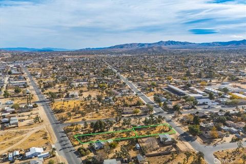 Photo of 10 Santa Fe Trail Trail, Yucca Valley, CA 92284 (MLS # JT24242318)