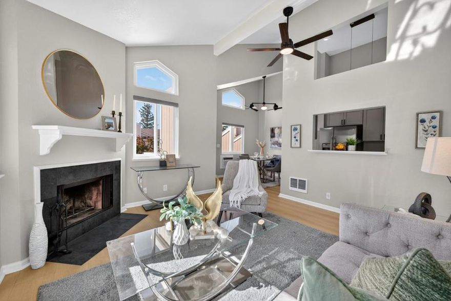 Welcome to 2867 S. Bascom Ave, #606, a beautifully updated, turnkey top-floor corner condo in the gated Cedar Terrace community. This rare 1-bedroom, 1-bathroom home features soaring vaulted ceilings, abundant natural light, and a modern design throughout. The remodeled kitchen boasts Shaker-style cabinetry, quartz countertops, stainless steel appliances, and a convenient pass-through/bar area perfect for entertaining. The living area includes a cozy wood-burning fireplace and views of the community pool. Freshly painted with luxury vinyl plank flooring, lighted ceiling fans, and double-pane windows, this home offers both style and functionality. Enjoy added convenience with in-unit laundry, ample closet space, two secure underground parking spaces, and an additional storage closet. Residents also have access to community amenities, including water, trash, a pool, spa, and clubhouse, with smart security at the entrance gate. Located near Downtown Campbell, The Pruneyard, Trader Joe's, Los Gatos Creek Trail, and top-rated schools, this home offers unbeatable convenience and a prime location. Don't miss this move-in-ready gem!