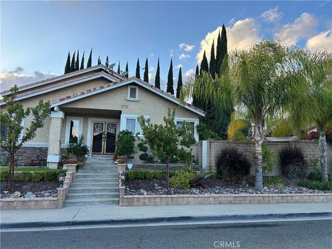 Photo of 42 Rainbow Ridge Rd, Phillips Ranch, CA 91766 (MLS # IV26078885)