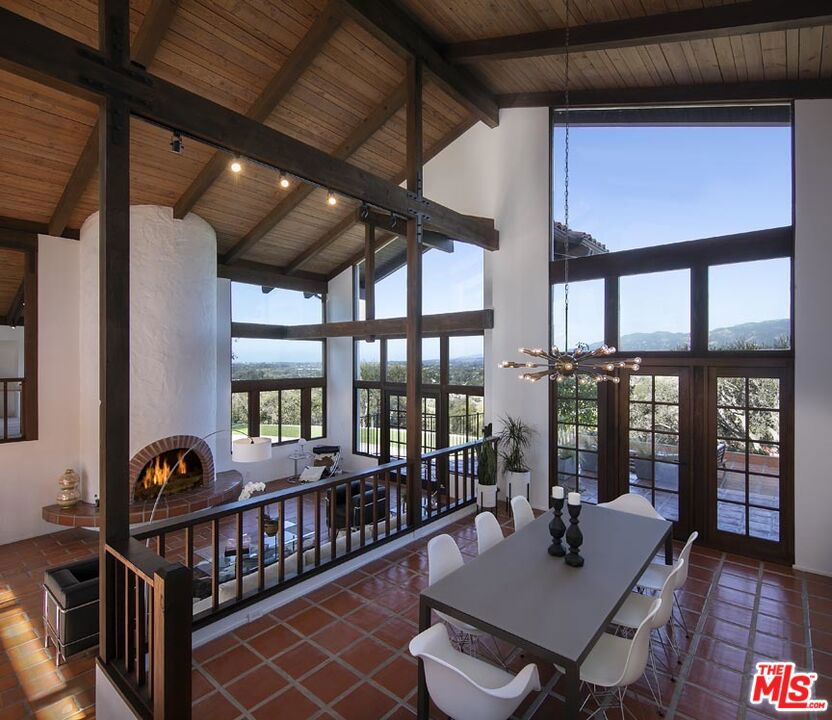 Strikingly dramatic gated Contemporary Estate with a Mediterranean flair features soaring ceilings and abundant natural light. Picture windows frame breathtaking panoramic views of the Santa Ynez Mountain range and the blue Pacific Ocean to the West. Watch the setting sun and spectacular sunsets that wash everything with a golden glow. Enjoy intimate dining or large group entertaining on the outdoor patio and pool/spa area. The 2021 renovation includes completely new State-of-the-Art gourmet kitchen, 4 bathrooms, laundry room and numerous upgrades inside and outside. The Estate features 5 bedrooms and 4 bathrooms, one of the bed/bath is a separate suite connected to the home and also with it's own entrance. There's a formal living room, formal dining, family room, office, and a bonus room (gym, crafts, library) in 4652 spacious square feet. Other attributes include an observation deck to enjoy the panoramic views, lawn area and stately cacti and agaves. Most of the 1.60 acres is usable with an approximately .50 flat acre for horses, ADU, collectable car garage, workshop, orchard or..... An ideal serene location, the estate rests high on a promontory that allows privacy from neighbors and panoramic views. This estate is located in prestigious Hope Ranch in Santa Barbara. Hope Ranch amenities include a Private Beach, Horse Riding Trails, Tennis Courts and separate membership available to La Cumbre Golf Club.