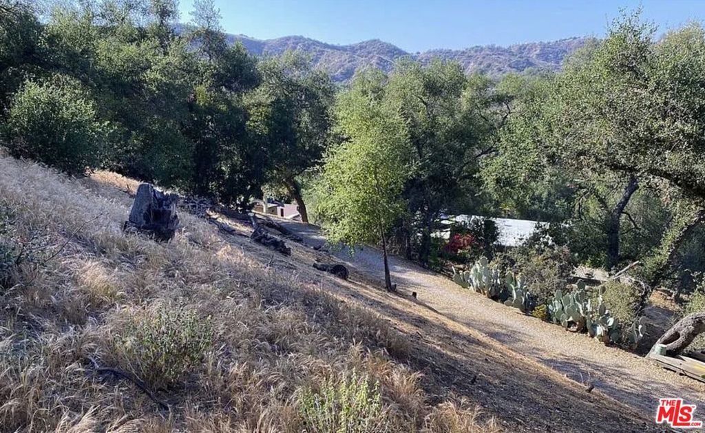 Amazing Opportunity to Build Your Dream Home in Topanga Canyon(APN# 4434-028-039) This exceptional parcel of land, just about 0.42 acres- 18,298 sqft, offers the perfect setting to create your dream estate in the serene and peaceful Topanga Canyon. Nestled in a tranquil neighborhood, this prime lot is conveniently located across the street from 21849 Callado Way, providing easy access to the beauty and charm of this coveted area. Don't miss your chance to own this rare piece of land and design your ideal home in one of Los Angeles' most sought-after locations.
