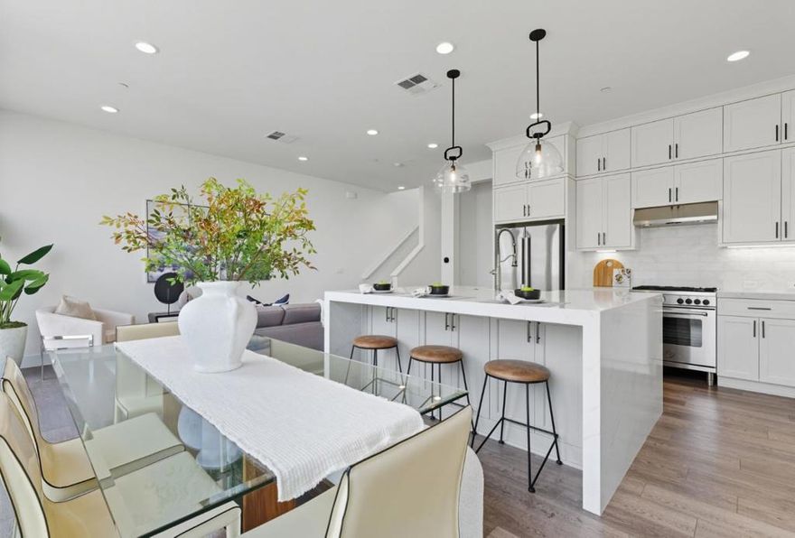 *LOW 2.5% INT RATE ASSUMPTION OPPORTUNITY* This is a truly exceptional and rare opportunity to save thousands on a monthly payment, and hundreds of thousands over life of loan.  4-bed/4-bath townhome built in 2022 and thoughtfully upgraded throughout. This spacious residence combines modern luxury with everyday convenience, featuring a fully SMART-tech enabled home system and high-end Italian appliances.  Set within a highly sought-after community with a low HOA, this move-in-ready home offers the perfect blend of style, comfort, and location. Enjoy the vibrant Alameda Point lifestyle with nearby waterfront parks, Seaplane Lagoon, ferry terminals to San Francisco, excellent schools, and the lively Spirits Alley with award-winning breweries and distilleries.  Homes in this community seldom come available. Don't miss your chance to secure a practically brand-new home with every upgrade already in place, including epoxy flooring in garage, plus EV hookups with ability to level 2 charge.