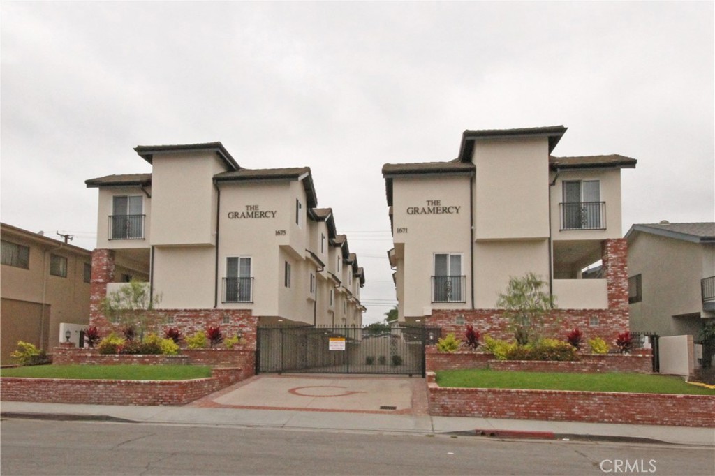 This newly renovated three-story townhouse offers the perfect blend of privacy, comfort, and style, with no one living above or below you. From the moment you arrive, you’ll appreciate the convenience of your own attached two-car garage, complete with generous storage space and washer/dryer hookups (tenant to provide washer/dryer). Upstairs, the main living level welcomes you with a beautifully updated kitchen featuring stainless steel appliances, sleek stone countertops, white cabinetry, and laminate flooring. The dining area sits just off the kitchen, while the spacious living room opens through sliding glass doors to a private balcony, an ideal spot to relax or entertain. A guest half-bath and an intercom system connected to the gated front entry add both practicality and peace of mind.
The third floor offers a comfortable retreat, with two bedrooms, a full bathroom, a linen closet, and even an additional balcony to enjoy fresh air and natural light. At the top of the landing, a cozy office nook provides a versatile space for work or study. The home is set within a gated-entry building with a charming courtyard, reflecting the community’s pride of ownership. Located in the heart of Historic Torrance, this townhouse places you within easy reach of shopping, dining, and leisure, all while offering a clean and beautifully maintained environment to call home.