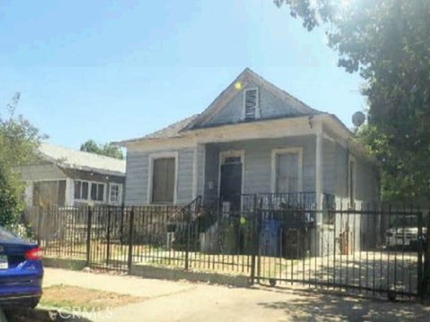 Photo of 908 E 49th Place, Los Angeles, CA 90011 (MLS # IV26133205)
