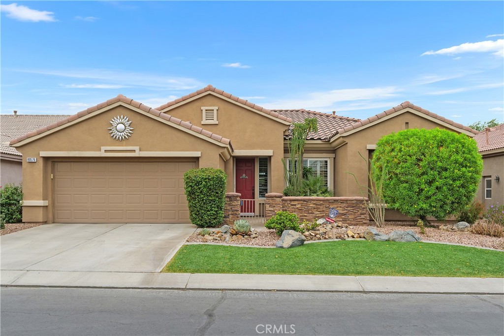 RARE 2079 SQ. FT. HOME IN BEAUTIFUL HERITAGE PALMS! 55+ Active Adult Community. This 3 bedroom & 2 Bath home offers spacious and elegant layout that is ideal for comfortable living and entertaining. Open formal LIVING & DINING rooms with a large FAMILY ROOM, all with VAULTED CEILINGS. Neutral carpet in bedroom and 16” tile in high-traffic areas. WHITE PLANTATION SHUTTERS and 5 CEILING FANS for breezy, refined ambiance. A GOURMET KITCHEN with 5 burner GAS STOVE; Electric Convection double oven; Raised-panel hickory cabinets; Corian countertops; Solar tube for natural lighting. All APPLIANCES included. LAUNDRY ROOM conveniently located off the kitchen area. MASTER SUITE includes a WALK-IN & mirrored closets; dual sinks; deep soaking tub with a separate shower. Entire house is ACCESSABLE. EXPANDED GARAGE with BUILT-IN CABINETS; work bench; room for a Golf Cart and durable “SNAP-IN” BLUE TILE FLOORING. The exterior has PROFESSIONALLY LANDSCAPED front yard with a cozy patio. The expansive ENTERTAINERS BACKYARD features: a SPOOL (Spa & Pool hybrid), with a CASCADING WATERFALL & Pet-Friendly side yard. Community amenities include: GOLF, TENNIS, PICKLEBALL, CLUBHOUSE, POOL, SPA, FITNESS CENTER and more! Low HOA fees!