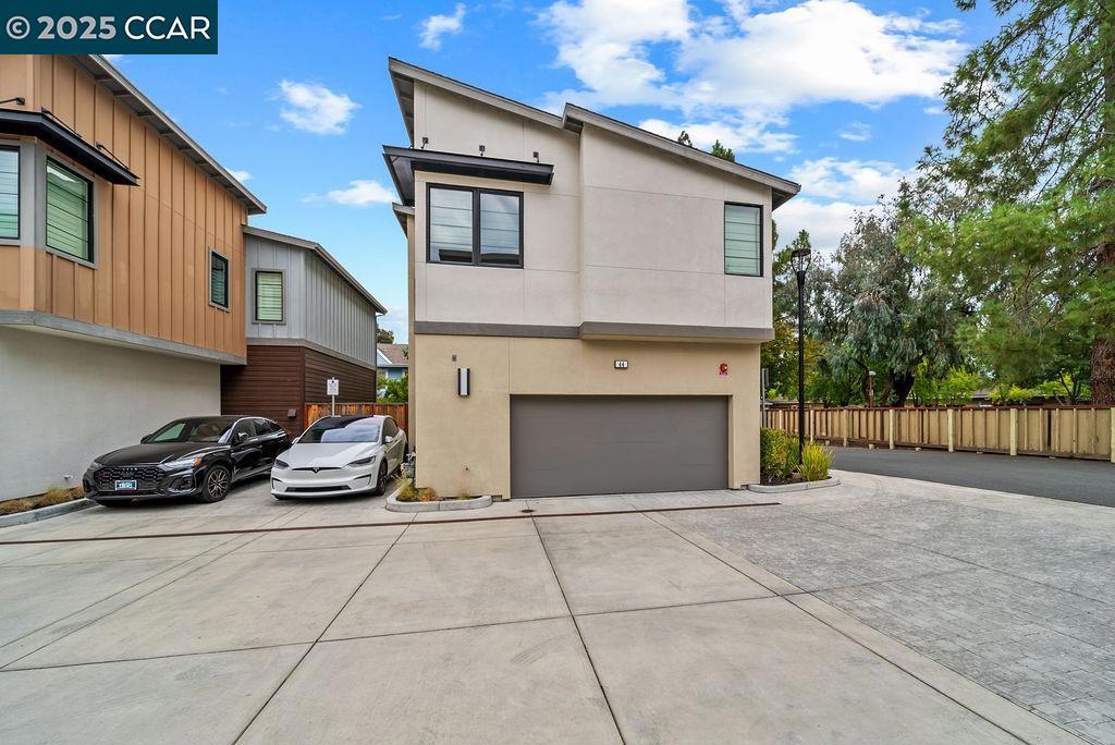 Welcome to 44 Analisa Lane, a contemporary townhome in the heart of Walnut Creek offering the perfect blend of style, convenience, and comfort. Built in 2019, this spacious residence features 4 bedrooms plus a versatile office/den and 3.5 bathrooms across nearly 1,950 square feet of thoughtfully designed living space. The open-concept main level is ideal for entertaining, with a modern chef’s kitchen showcasing stainless steel appliances, a large center island, and seamless flow into the bright living and dining areas. Upstairs, the generous primary suite includes a spa-inspired bathroom and walk-in closet, while additional bedrooms provide ample space for family, guests, or a home office. A private attached two-car garage, in-unit laundry hookups, and energy-efficient systems add to the home’s everyday ease. Situated in a boutique community of just 11 homes, residents enjoy low-maintenance living with HOA-covered exterior upkeep. The location is unmatched—just moments from Walnut Creek’s vibrant downtown, BART, top-rated schools, trails, and endless dining and shopping. Perfectly balancing modern design with walkable lifestyle amenities, this home offers a rare opportunity to own a turnkey property in one of the Bay Area’s most desirable communities.