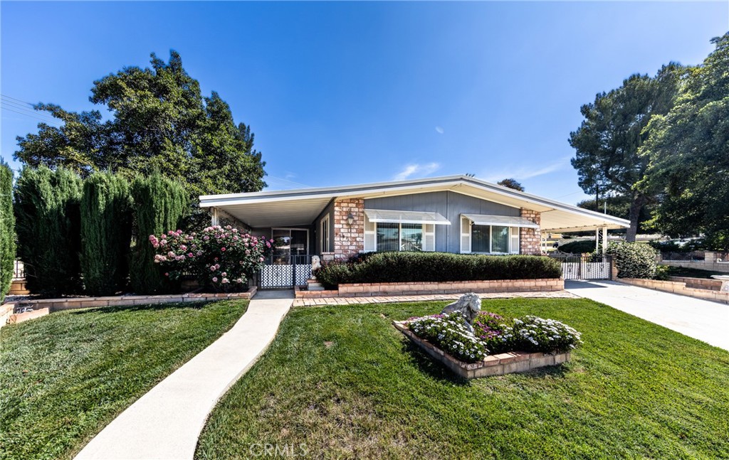 This home has alot to offer it has a great location in a 55+ community in Calimesa. The Mountain views from every part of the yard and the storage you will have plenty of it to make your move easy. This home is close by the club house where the community loves to hold all kinds of event for the people that live in the sharondale community. Come take a tour of this great home in a great location.