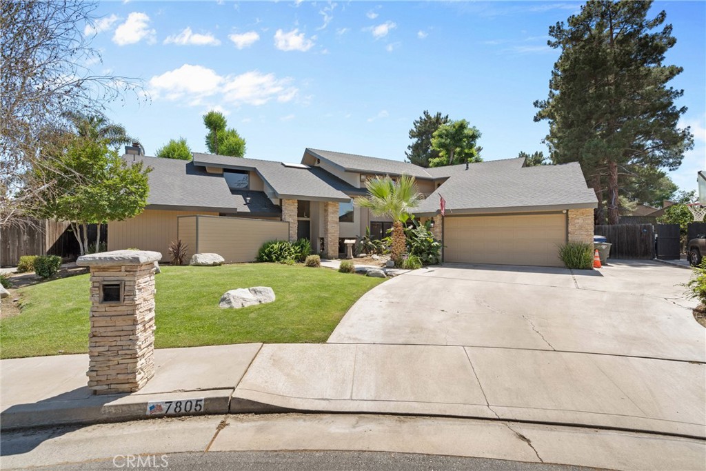 **Stunning One-of-a-Kind Home in the Highly Desirable Stockdale Estates Neighborhood!**
Discover resort-style living in this exceptional 4,979 sq. ft. home situated on over a 16,000 sq. ft. lot. Nestled at the end of a serene cul-de-sac, this property boasts a beautifully tree-lined street with ample parking.
This 4-bedroom, 4-bathroom residence features an additional office space and offers an abundance of storage. The expansive living room showcases vaulted beamed ceilings, a cozy fireplace, a wet bar, and a movie screen that conveniently lowers from the ceiling, perfect for entertaining.
The primary bedroom is a true retreat, featuring a large bathroom and a walk-in closet, along with two balconies—one leading to the gorgeous backyard. Upstairs, you'll find a cozy loft, and all bedrooms are spacious, providing plenty of room for comfort.
Natural light floods the home through numerous windows, enhancing the ambiance. The gourmet kitchen is a chef's dream, equipped with granite countertops, a Subzero fridge, and a 6-burner stove with grill. Enjoy the convenience of a laundry chute that connects the upstairs to the first-floor laundry room. A welcoming drop-off zone/mudroom greets you as you enter from the garage.
Step outside to a stunning backyard that's perfect for entertaining or relaxing, featuring a beautiful pool, a tranquil pond, ample grassy areas, and fruitful orange and peach trees. Additional spaces include a sunroom and a room with air conditioning currently used as a home gym. A built-in barbecue grill completes this outdoor oasis.
Located close to parks, schools, shopping, restaurants, the University of Bakersfield, and the Stockdale Country Club, this home is perfect for enjoying community festivities, including the 4th of July fireworks right from your backyard.
This house has so much to offer and an abundance of charm that you must see in person! Endless possibilities await you in this magnificent home!