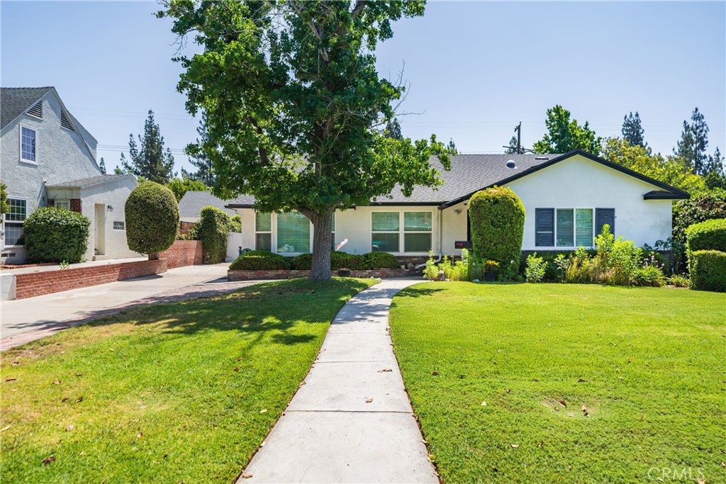 Welcome to this charming 1948-built home nestled on a generous quarter-acre lot in beautiful North San Bernardino. The expansive single-story layout boasts 2,286 sq.ft. of versatile living space, with 3 bedrooms and 2.5 bathrooms—perfect for families, those working from home, or anyone craving extra comfort. Bright and airy living spaces, central air conditioning, and a cozy fireplace—an ideal mix of modern convenience and classic charm. Well-appointed kitchen with ample counter space and cabinetry flow seamlessly into the dining area, ready for easy entertainment. Long driveway with a two-car detached garage with additional parking rare find in this neighborhood. Outdoor retreat: A spacious backyard on a 0.26-acre lot (over 11,000 square feet) provides a serene setting for gardening, lounging, or adding your own pool. Prime location: Situated in the desirable Nena neighborhood, just minutes from Arrowhead Country Club, local parks, schools, shopping, and freeway access. Commute-friendly in all directions—mountains, beaches, desert, and more.