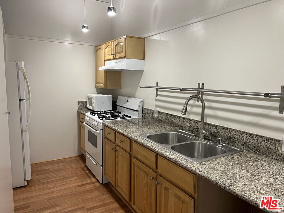 Well maintained 2 bedroom/1 bathroom on the second floor and a private balcony. Parking fee of $100 included in the asking rent. The unit will be leased in "as is where it is" condition