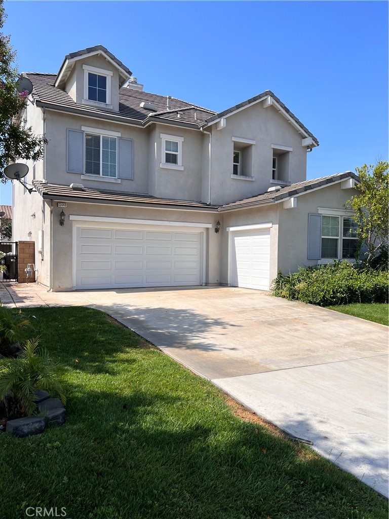 Beautiful 3 Level, 5 Bedroom (1-Bedroom Downstairs), 3 Bathroom Home built in 2007. Home was remodeled in 2012. Nestled away on a cul-de-sac in a quiet neighborhood within walking distance to schools and parks. Open floorplan with a large kitchen with granite counters, plenty of cabinets and storage, separate cooktop range, oven, and built-in microwave. All Bathrooms have granite counters. Large Tile and Wood flooring throughout 1st floor. Large master bedroom with separate shower and a spacious walk-in closet. Downstairs bedroom and full bathroom. Bonus third floor loft can be used as office, game room, or children's playroom. Spacious backyard for get togethers. Separate cooling/heating zone system for each floor can save you money on your utility bill. Beautiful view from the master bedroom. 4-car, tandem garage. Close to schools and the 71,15 and 60 Freeways!