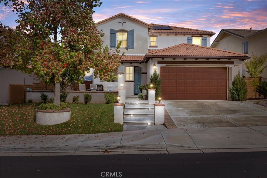 VIEWS! Welcome to this beautifully updated 4-bedroom, 2.5-bath home offering over 2,600 sq. ft. of comfortable, contemporary living in one of Valencia’s premier gated communities. Positioned to capture beautiful hillside and neighborhood views, this home blends space, style, and functionality.
Inside, you’re welcomed by soaring ceilings, recessed lighting, and bright, open living areas that set the tone for both relaxation and entertaining. The main level features a seamless flow from the family room to the kitchen, creating an inviting central gathering space. Durable laminate flooring adds a clean, modern feel throughout the home.
The open kitchen is a standout, featuring a large center island, granite-style counters, stainless steel appliances, and generous cabinetry. Its open layout makes everyday cooking and hosting effortless.
All four bedrooms are located upstairs, offering a quiet and private retreat. The primary suite includes a walk-in closet along with an ensuite bath featuring a soaking tub, separate walk-in shower, and dual vanities. Additional bedrooms are well-sized with easy access to upgraded bathrooms.
Step outside to a welcoming backyard space with a covered patio, perfect for outdoor dining or relaxing while taking in the views. The home also includes solar, helping keep monthly electricity costs low.
Living in West Hills means access to exceptional community amenities including pools, a spa, clubhouse, parks, and scenic walking paths—ideal for enjoying the outdoors just steps from home.