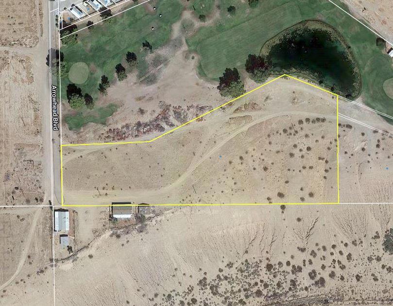 Golf Course Development. Golf course views on North side and Bluff views overlooking the valley on the South. Come build your dream home or develop the entire site. City water available from South side. One of a kind property!!!