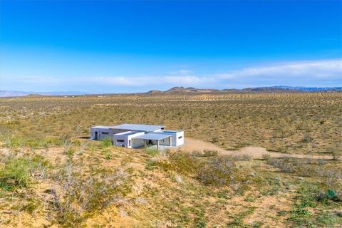 Photo of 621 N Sage Avenue, Yucca Valley, CA 92284 (MLS # JT26037458)